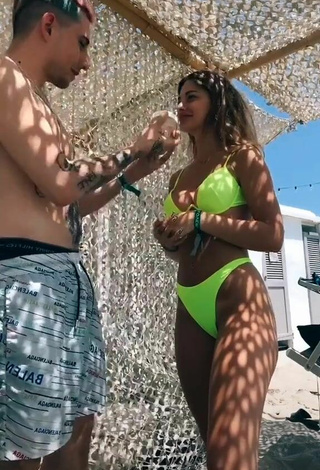 Hottie Roberta Carluccio Shows Cleavage in Lime Green Bikini