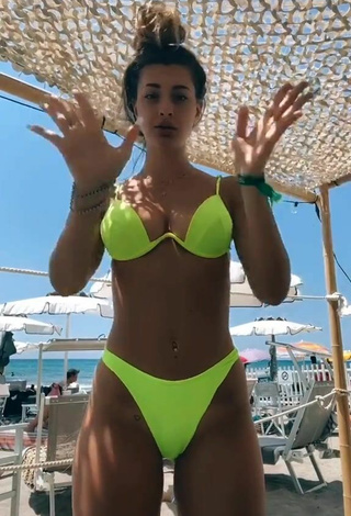 4. Beautiful Roberta Carluccio Shows Cleavage in Sexy Lime Green Bikini