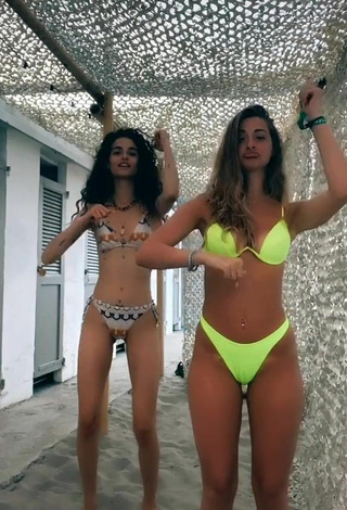 5. Sweetie Roberta Carluccio Shows Cleavage in Lime Green Bikini