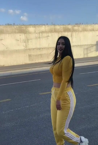 4. Sexy Seherkoçaker in Yellow Crop Top in a Street