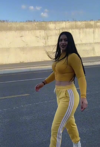 5. Sexy Seherkoçaker in Yellow Crop Top in a Street