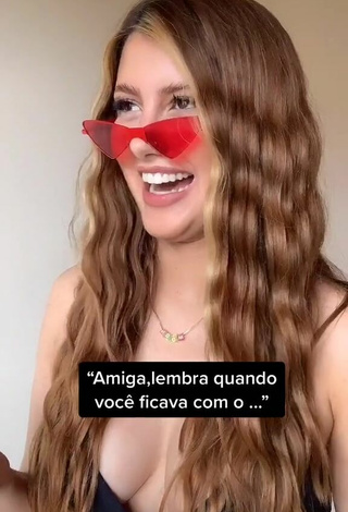 1. Sexy Sofia Oliveira Shows Cleavage in Black Bikini Top