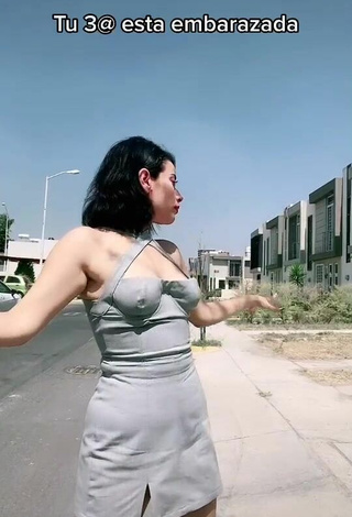 Sexy Soy Maryorit Shows Cleavage in Grey Dress in a Street