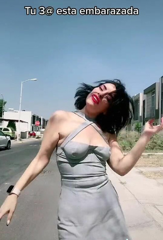 4. Sexy Soy Maryorit Shows Cleavage in Grey Dress in a Street
