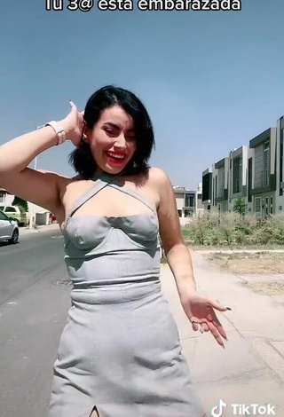 6. Sexy Soy Maryorit Shows Cleavage in Grey Dress in a Street
