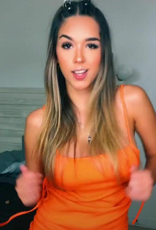 3. Hot Susana Torres Shows Cleavage in Orange Dress