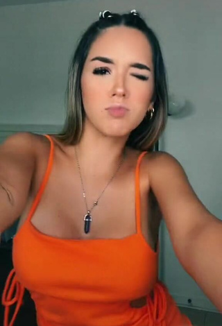 3. Sexy Susana Torres Shows Cleavage in Orange Dress