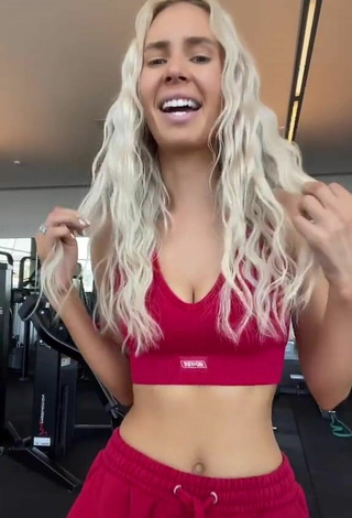 4. Sexy Bunny Barbie Shows Cleavage in Red Sport Bra in the Sports Club
