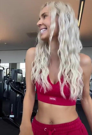 5. Sexy Bunny Barbie Shows Cleavage in Red Sport Bra in the Sports Club