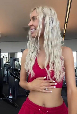 6. Sexy Bunny Barbie Shows Cleavage in Red Sport Bra in the Sports Club