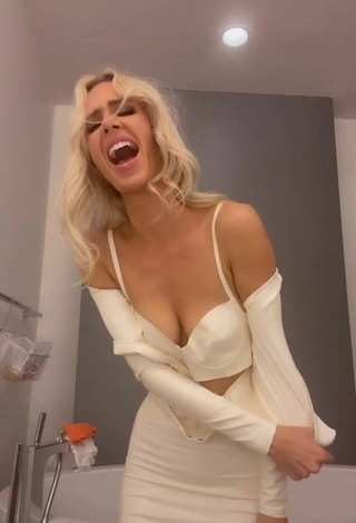 4. Sexy Bunny Barbie Shows Cleavage in White Bra
