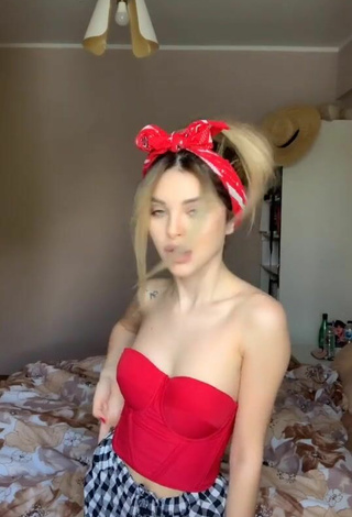 3. Sexy Valerie Lungu Shows Cleavage in Red Corset