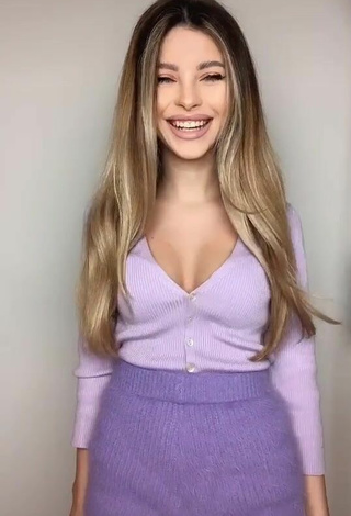3. Sexy Valerie Lungu Shows Cleavage in Violet Top