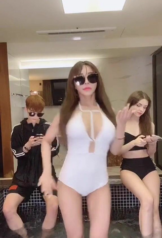 5. Sweetie velymom Shows Cleavage in White Swimsuit
