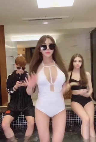6. Sweetie velymom Shows Cleavage in White Swimsuit
