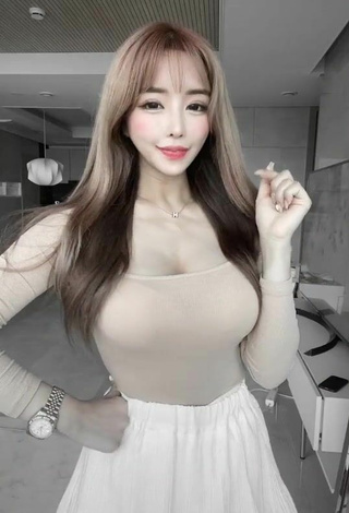 Beautiful velymom Shows Cleavage in Sexy Beige Top