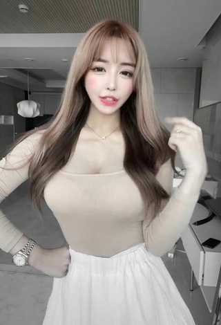 4. Beautiful velymom Shows Cleavage in Sexy Beige Top