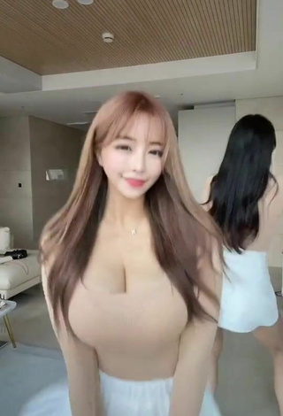 5. Sweetie velymom Shows Cleavage in Beige Top
