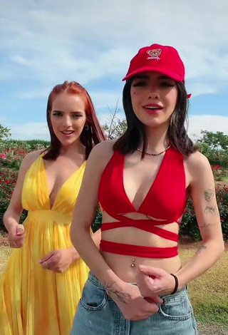 3. Sexy Vee Castro Shows Cleavage in Red Bikini Top