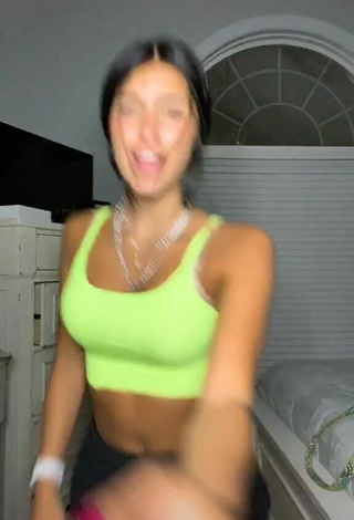 1. Erotic Taylor Mackenzie Shows Cleavage in Lime Green Sport Bra