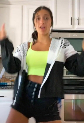 4. Pretty Taylor Mackenzie Shows Cleavage in Lime Green Crop Top