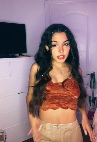 4. Sexy Alejandra Olivera Shows Cleavage in Orange Tube Top