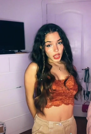5. Sexy Alejandra Olivera Shows Cleavage in Orange Tube Top