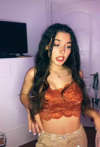6. Sexy Alejandra Olivera Shows Cleavage in Orange Tube Top