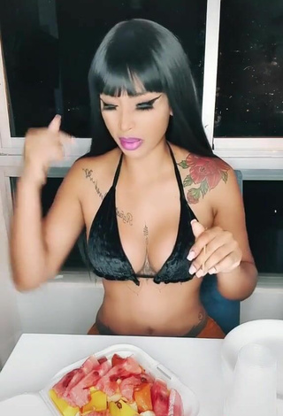 3. Erotic Aliany García Shows Cleavage in Black Bikini Top