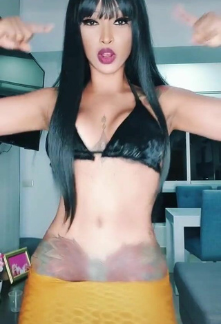 2. Cute Aliany García Shows Cleavage in Black Bikini Top