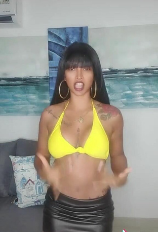 5. Sexy Aliany García Shows Cleavage in Yellow Bikini Top