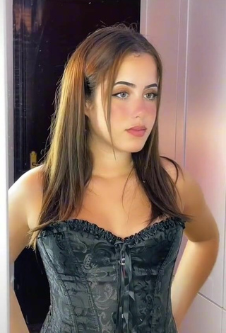 2. Sexy Ana T Shows Cleavage in Black Corset