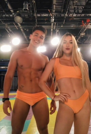 2. Hottest Azul Granton Shows Cleavage in Orange Bikini