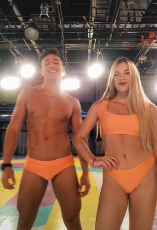 3. Hottest Azul Granton Shows Cleavage in Orange Bikini