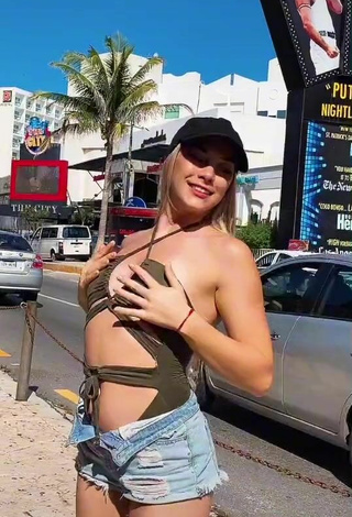 5. Sexy Azul Granton Shows Cleavage in Swimsuit in a Street