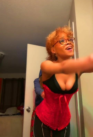 2. Sexy Challan Dang Shows Cleavage in Red Corset