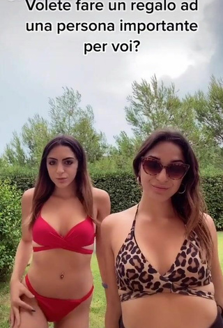 Hot Cora & Marilù Shows Cleavage in Red Bikini