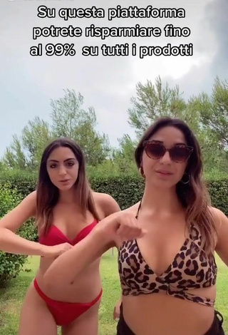 3. Hot Cora & Marilù Shows Cleavage in Red Bikini
