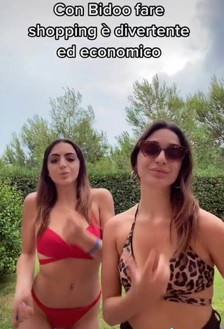 6. Hot Cora & Marilù Shows Cleavage in Red Bikini