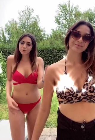 Sexy Cora & Marilù Shows Cleavage in Red Bikini
