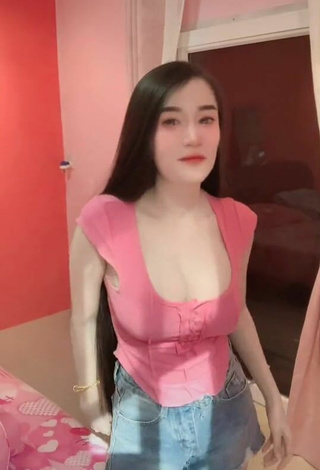 Sexy Nuntida Chuangchoo Shows Cleavage in Pink Crop Top