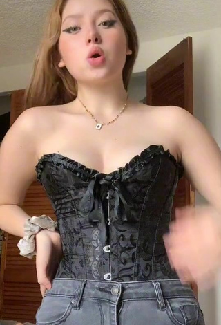 2. Sexy Daniela Shows Cleavage in Black Corset