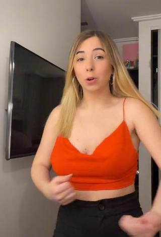 3. Sexy Dany Consoli Shows Cleavage in Orange Crop Top and Bouncing Boobs