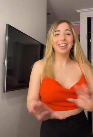 4. Sexy Dany Consoli Shows Cleavage in Orange Crop Top and Bouncing Boobs