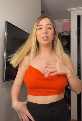 6. Sexy Dany Consoli Shows Cleavage in Orange Crop Top and Bouncing Boobs