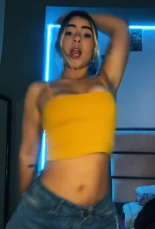6. Chantall Pizzino Shows Cleavage in Inviting Yellow Crop Top and Bouncing Breasts