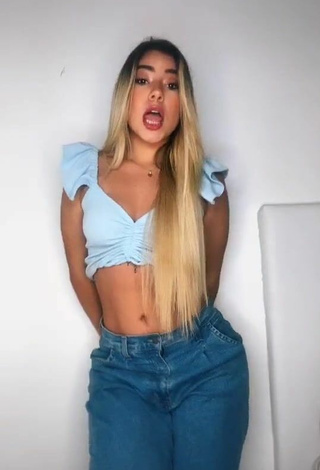 1. Alluring Chantall Pizzino Shows Cleavage in Erotic Blue Crop Top