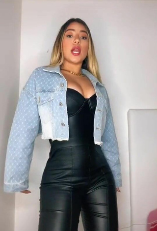 Sweetie Chantall Pizzino Shows Cleavage in Black Bodysuit