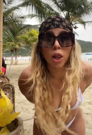 5. Erotic Chantall Pizzino Shows Cleavage in White Bikini at the Beach