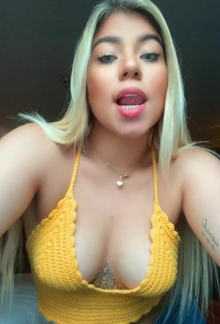 Sweetie Chantall Pizzino Shows Cleavage in Yellow Crop Top